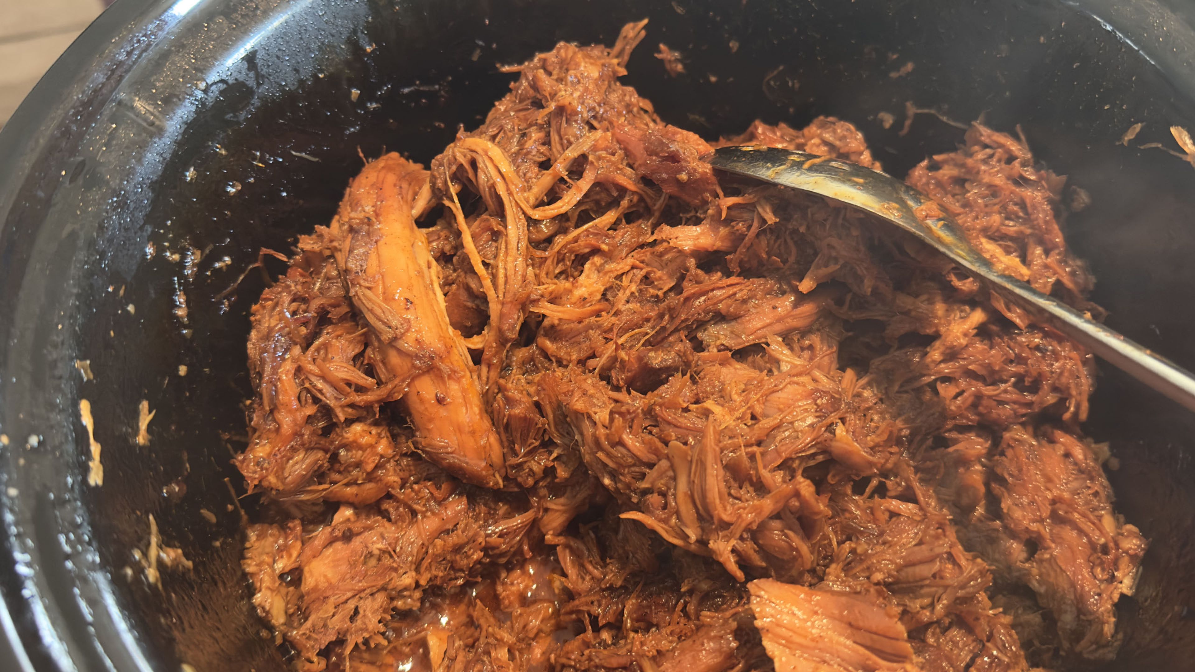 This Slow Cooker Pulled Pork recipe features a cane sugar root beer for a sweet and flavorful touch. Toss everything in, let the magic happen, and enjoy!