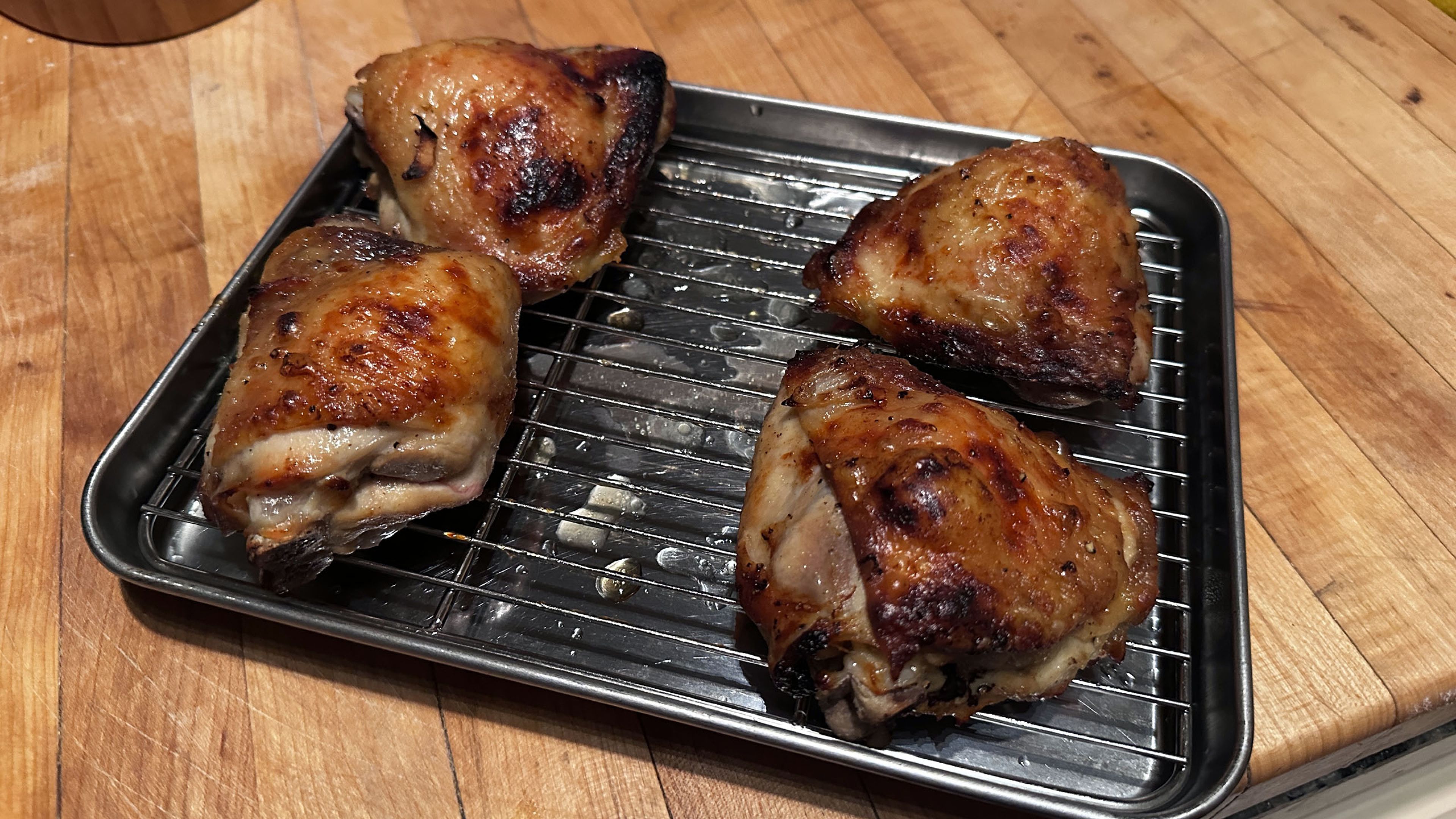 These easy oven-roasted chicken thighs are marinated in a maple-acv blend for maximum juiciness and crispiness. A simple, flavor-packed dinner ready in under an hour!