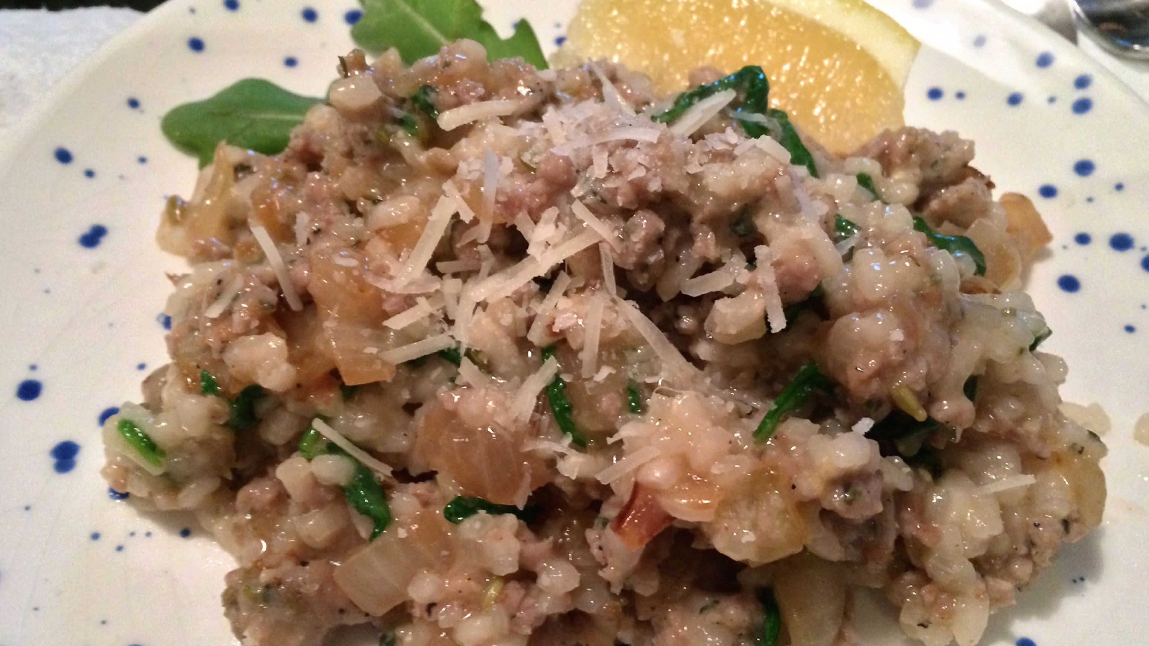 Creamy risotto meets savory Italian sausage, sweet caramelized onions, and peppery arugula in this mouthwatering dish. Stick to the technique and Arborio rice, and let your culinary creativity run wild!