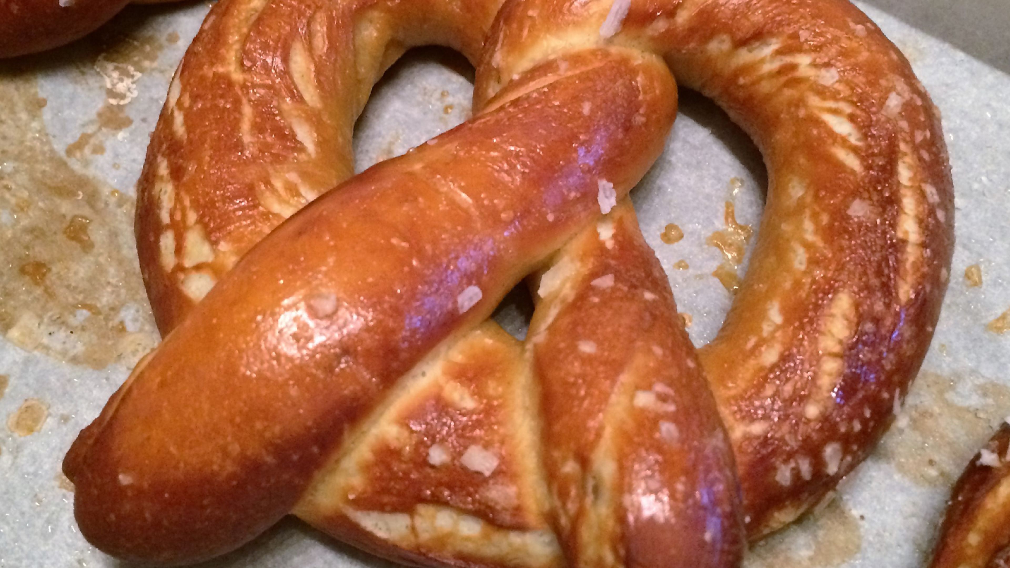 Eric’s Buttery Soft Pretzels are melt-in-your-mouth delicious! Perfect fresh out of the oven, or paired with honey mustard or nacho cheese for ultimate snacking bliss.