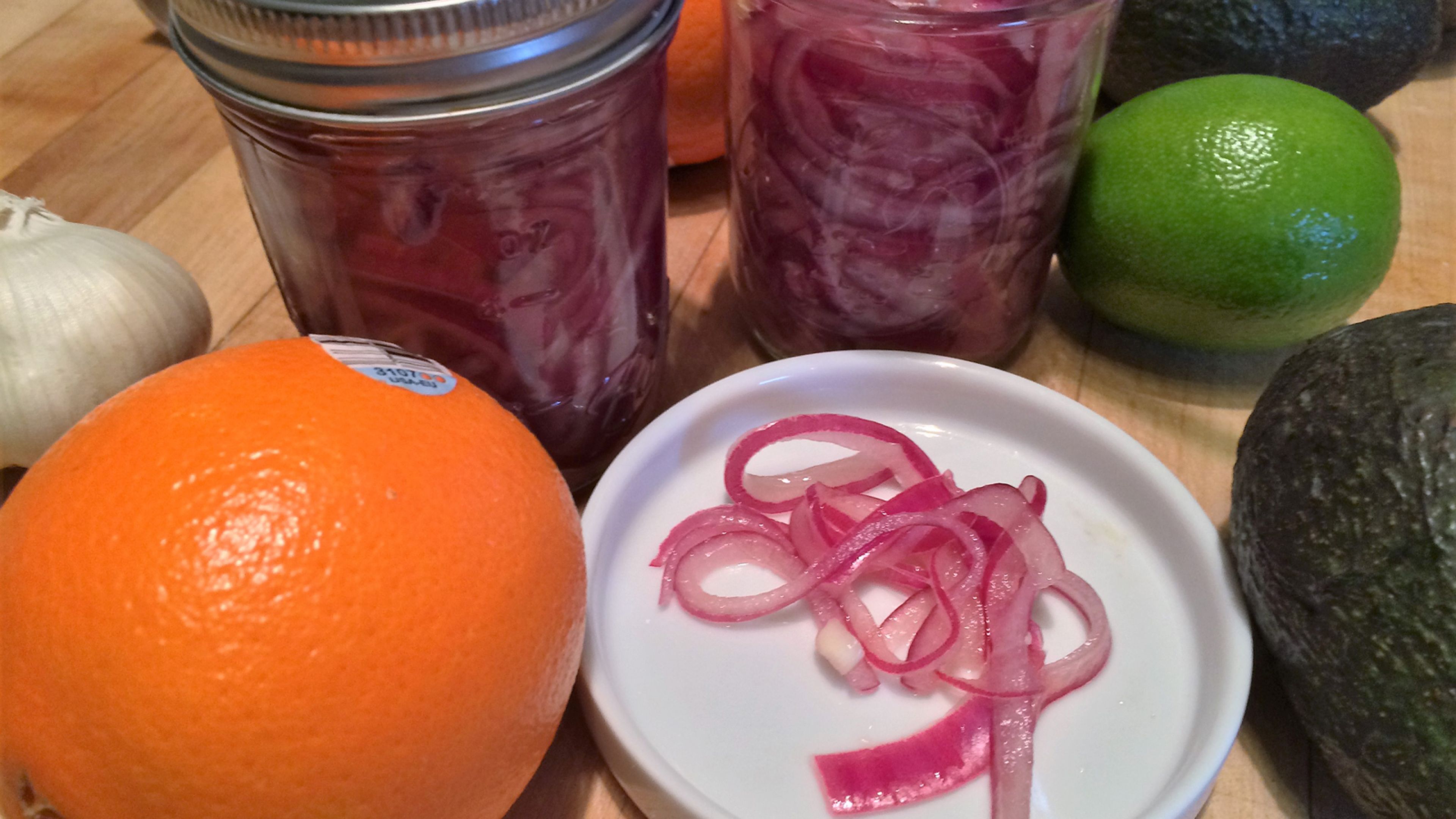 These pickled red onions are a tangy, slightly sweet, and downright magical addition to tacos, sandwiches, or anything that needs a zing of flavor. Quick, simple, and a total flavor bomb!