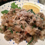 Creamy risotto meets savory Italian sausage, sweet caramelized onions, and peppery arugula in this mouthwatering dish. Stick to the technique and Arborio rice, and let your culinary creativity run wild!