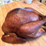 This applewood-smoked turkey is juicy, flavorful, and destined to steal the show. With bright notes from the brine and just the right amount of smoky goodness, it’s perfect for any feast or tailgate party.